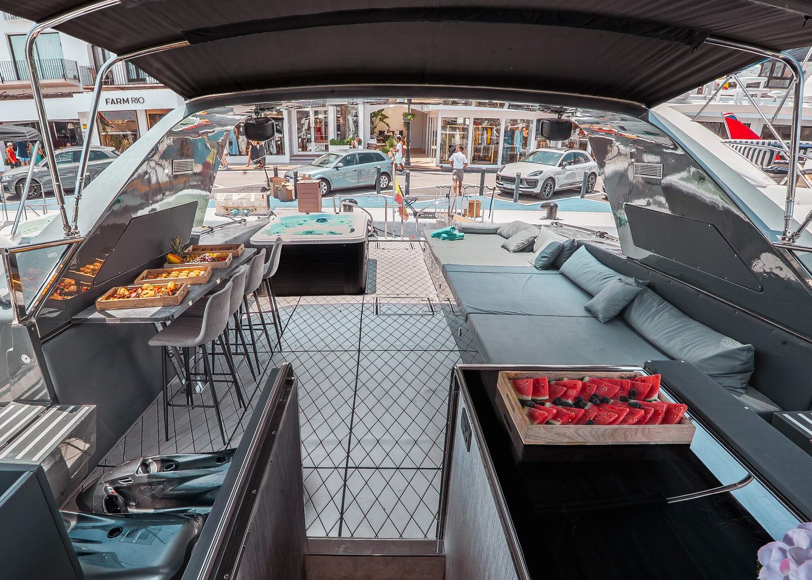Aft deck with bar seating and catering on Happy Hour