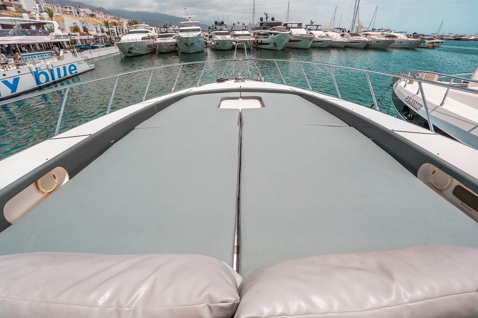 Bow sun pads and Puerto Banus marina view from Happy Hour