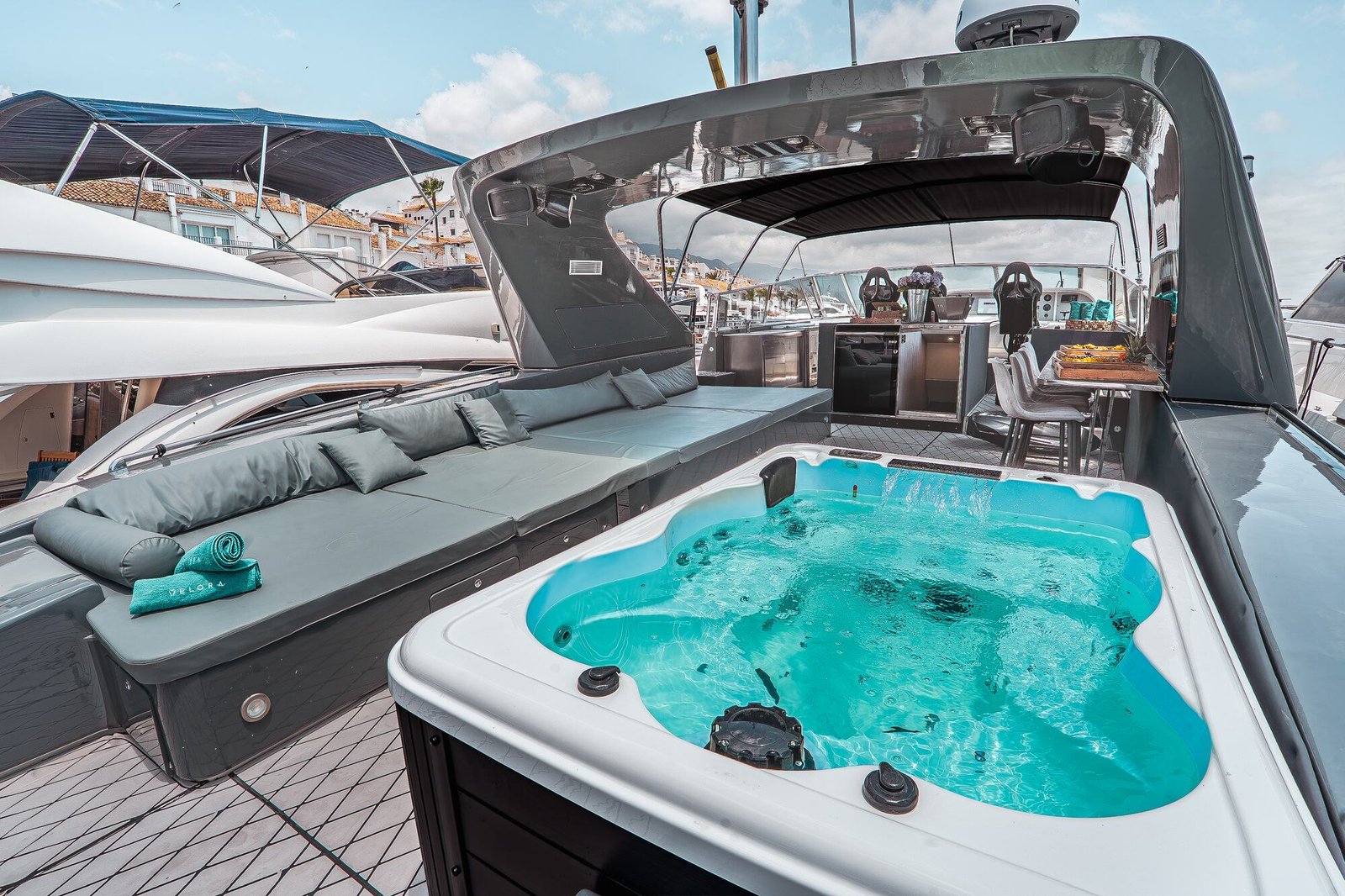 Jacuzzi on the aft deck of Happy Hour Mangusta 80