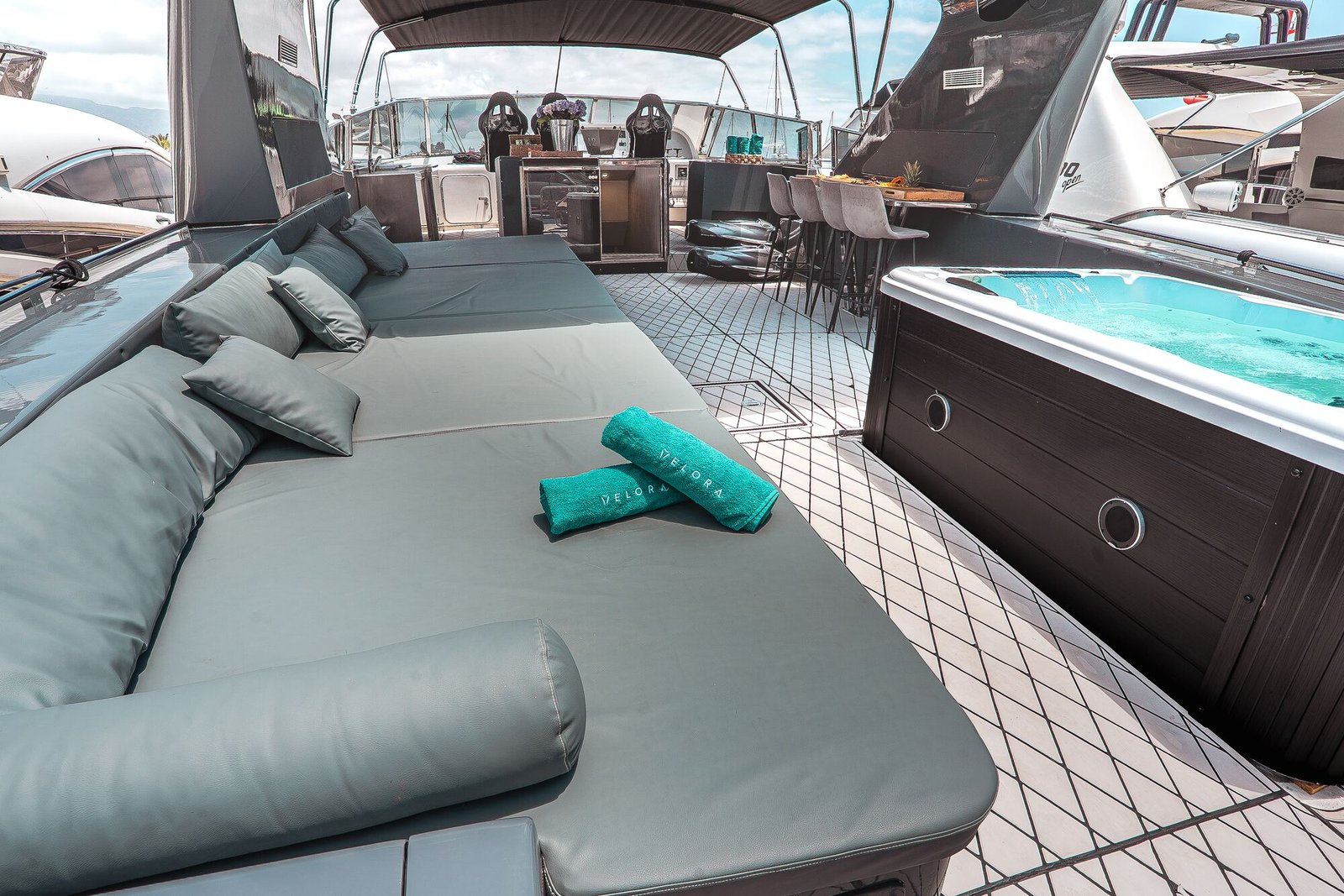 Sun pads with VELORA towels aboard Happy Hour